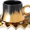 Elegant modern ceramic cup with matching saucer in minimalist design.