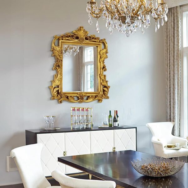 Elegant antique gold mirror with ornate vintage frame for home decor.