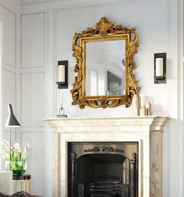 Decorative antique gold mirror with detailed frame for timeless interiors.