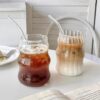 Elegant ribbed drinking glass with vertical wave design, durable and stylish for home.