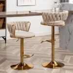 Golden bar stools with versatile design for modern interiors.