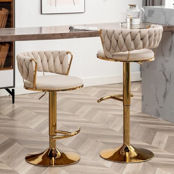 Golden bar stools with versatile design for modern interiors.