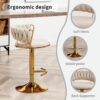 Luxury velvet upholstered gold base bar stools designed for modern kitchens.
