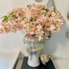White and gold vase with lid – stylish decorative accent for living room or dining table
