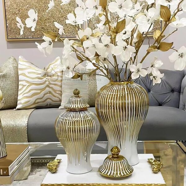 Modern ceramic jar vase with white finish and gold ribbing