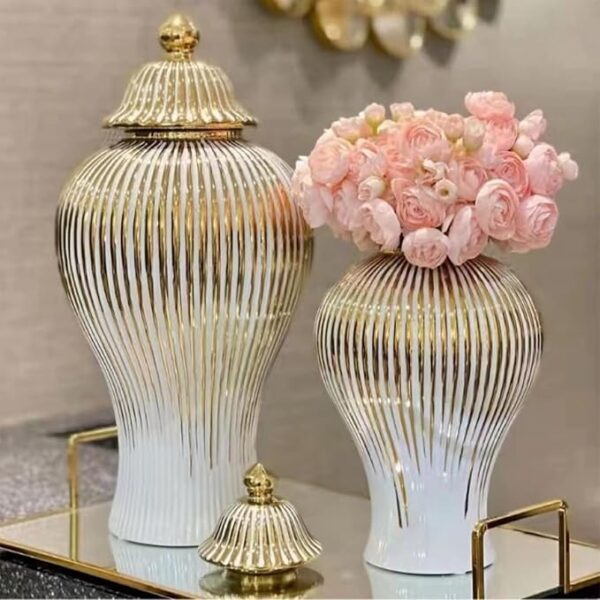 Elegant white and gold ceramic vase with lid for home decor