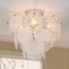 Premium glass ceiling chandelier with artistic design and adjustable lighting.