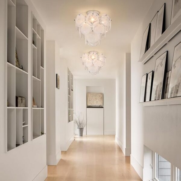 Rustic ceiling light chandelier with metal frame and soft glowing bulbs.