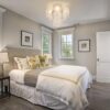 Modern ceiling chandelier with sleek design, perfect for bedrooms and foyers.