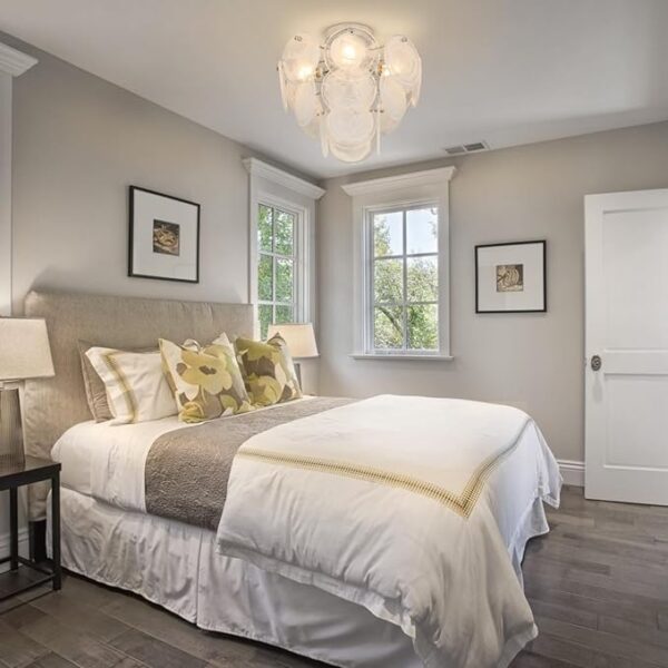 Modern ceiling chandelier with sleek design, perfect for bedrooms and foyers.