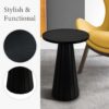 Elegant round pedestal side table with tapered base, adding sophistication to modern interiors.
