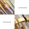 Crystal wall lamp featuring sparkling glass prisms and a stylish metallic finish for chic home decor.