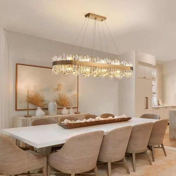 Modern gold chandelier with hanging crystal raindrops