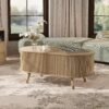 Lift top oval coffee table with raised tabletop